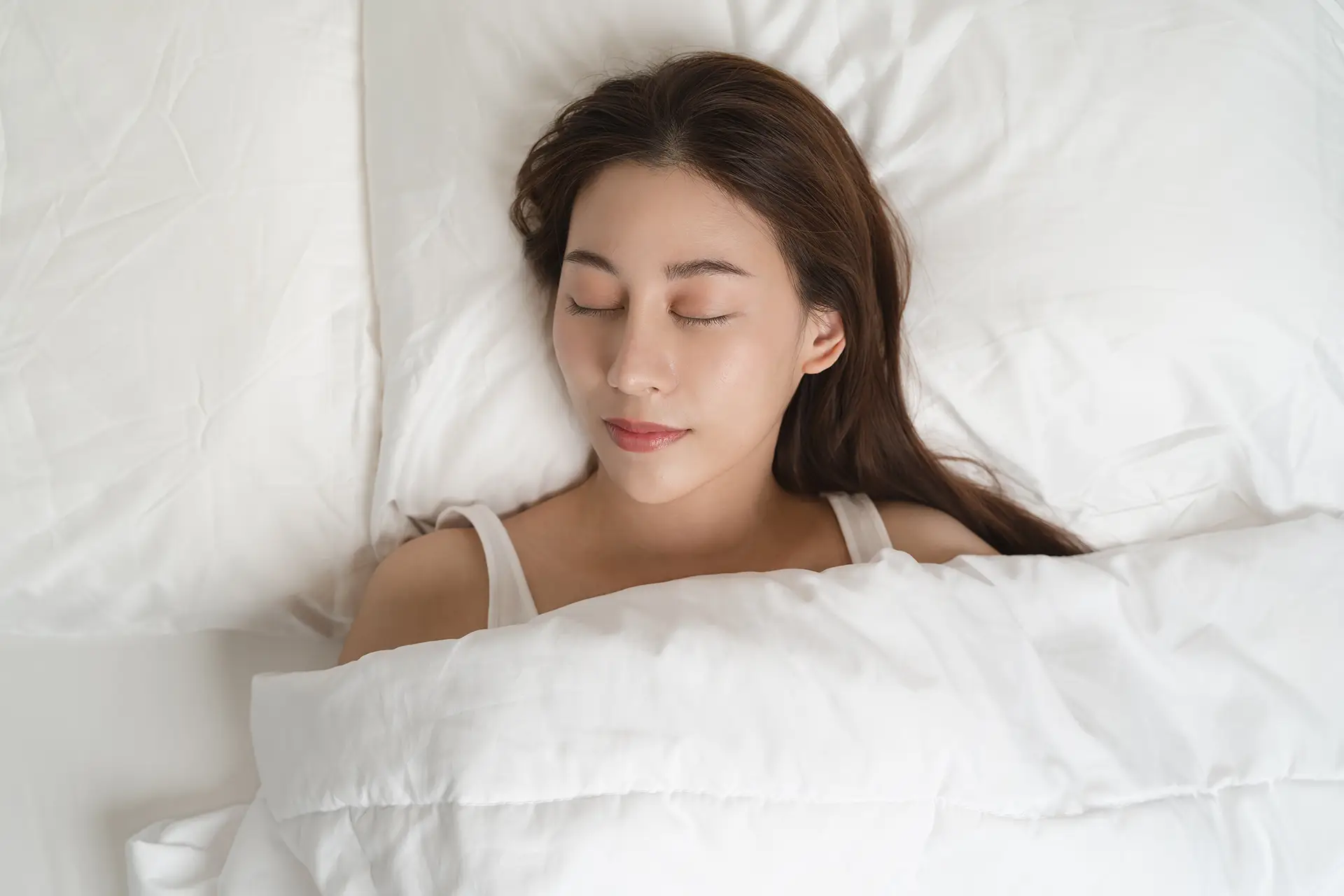 Woman resting after a fibroid removal procedure - Dr TC Chang